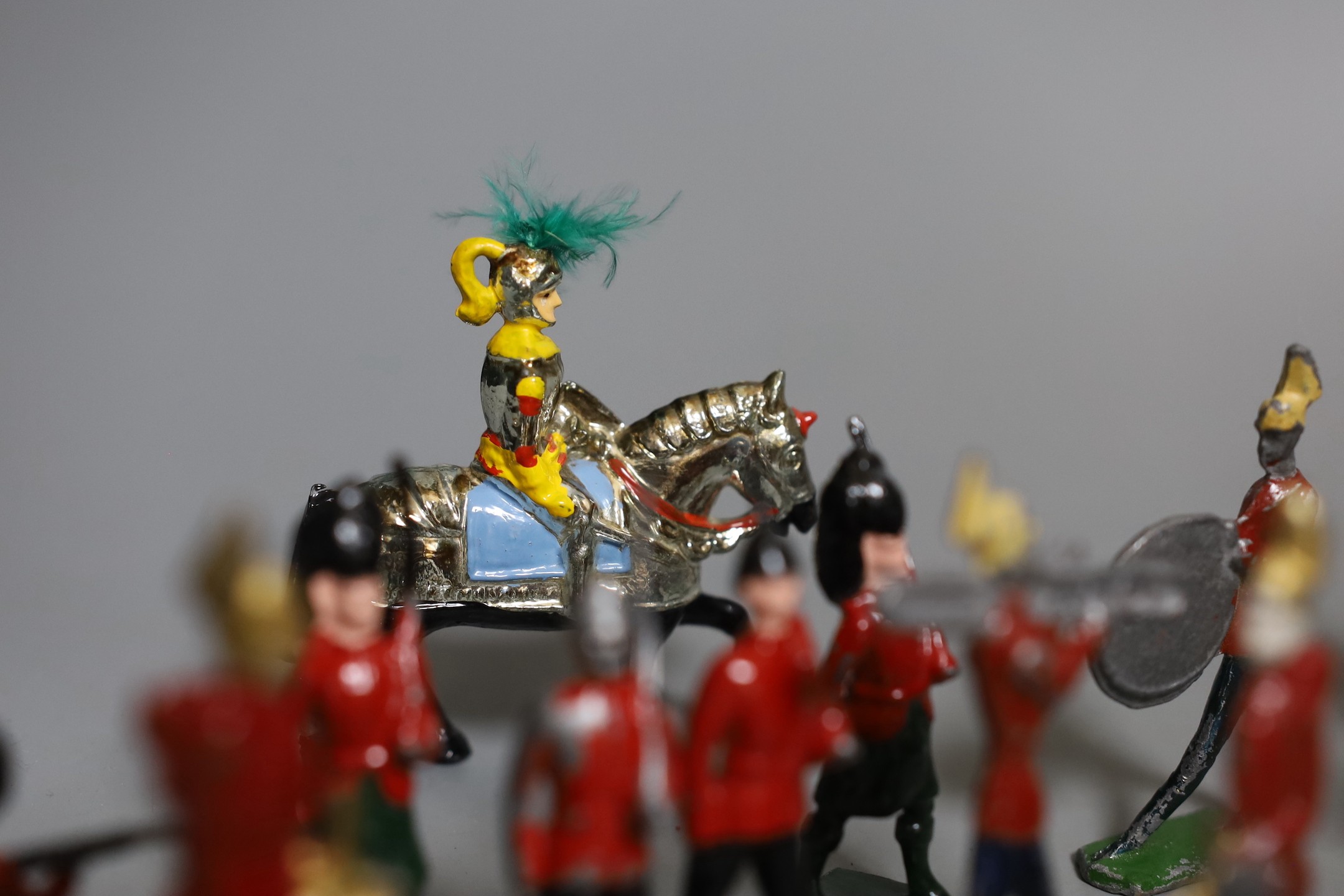 A quantity of cold painted lead soldiers and band.